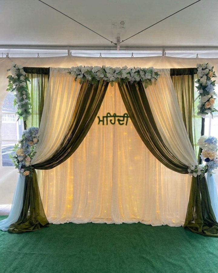 Mehndi backdrop set up inside a rental tent in Calgary
